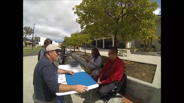 A Jehovah's Witness checks his watch during the  Two Minute Drill