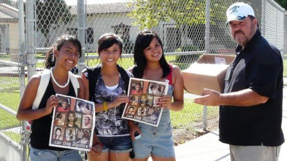 Three girls with flyers